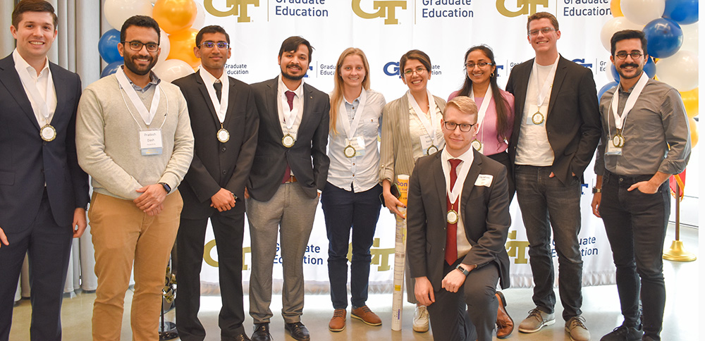 A group of students who won awards at a conference